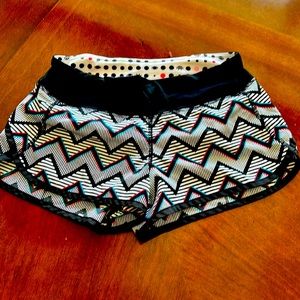 Lululemon sports shorts, size 2, black white, red and teal